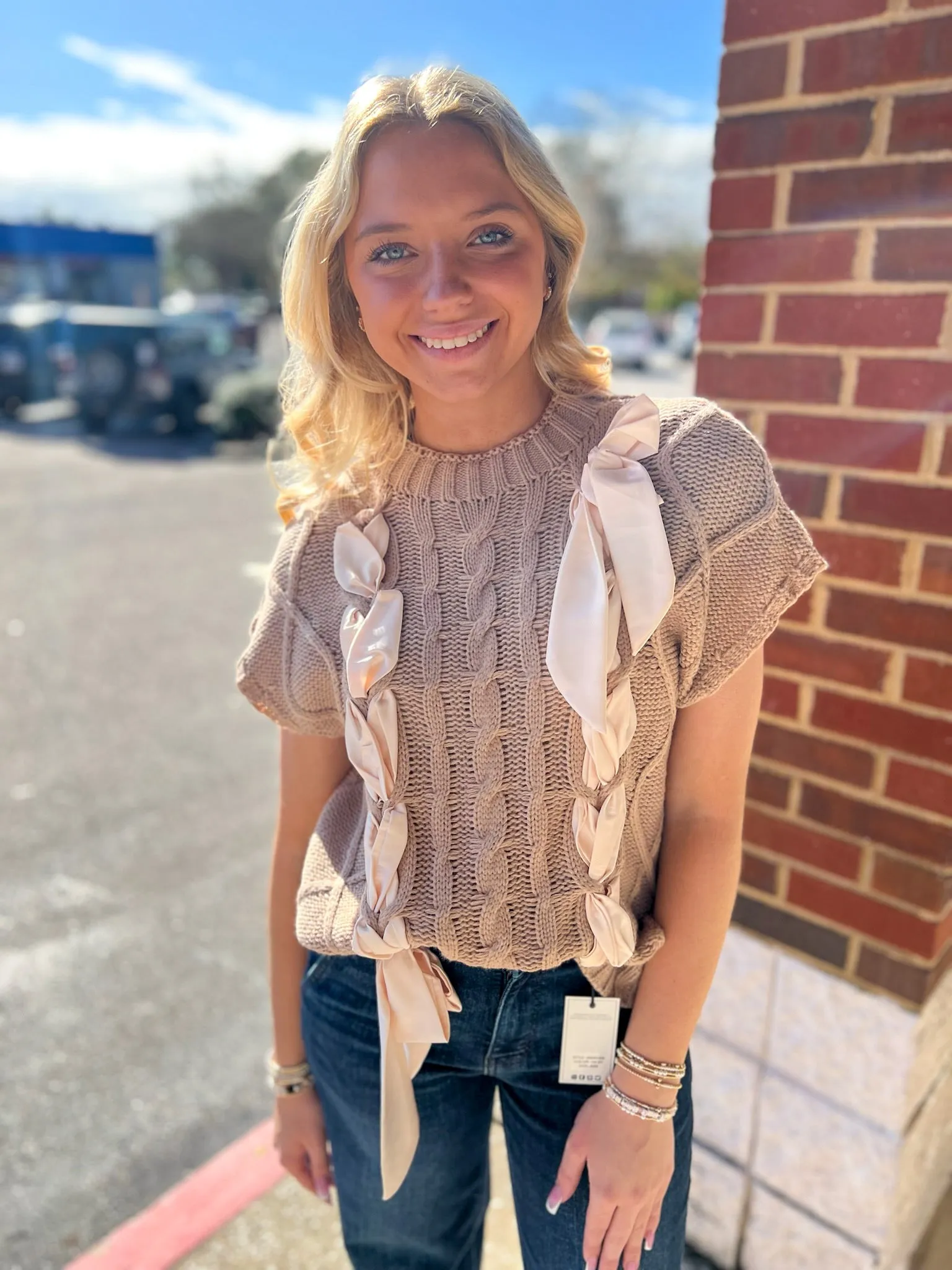 Pure Perfection Taupe Sleeveless Sweater with Bow Detail